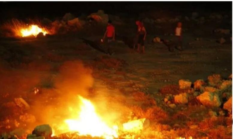 مواجهات عنيفة في جالود جنوب نابلس عقب هجوم مستعمرين وإحراق أراض زراعية