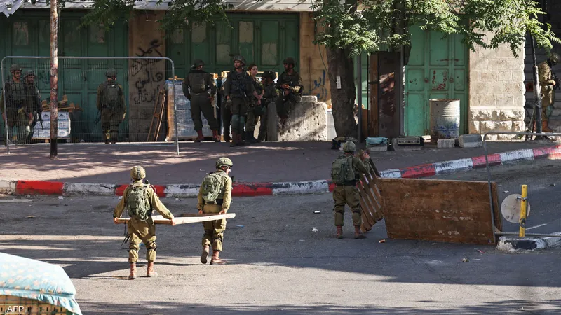 إسرائيل تعتقل 66 فلسطينيا في الضفة الغربية
